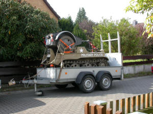 Kettenkrad and trailer loaded on transport trailer